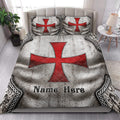 Knights Templar quilt bedding styled in a bright bedroom with bold red cross artwork and ornate medieval borders
