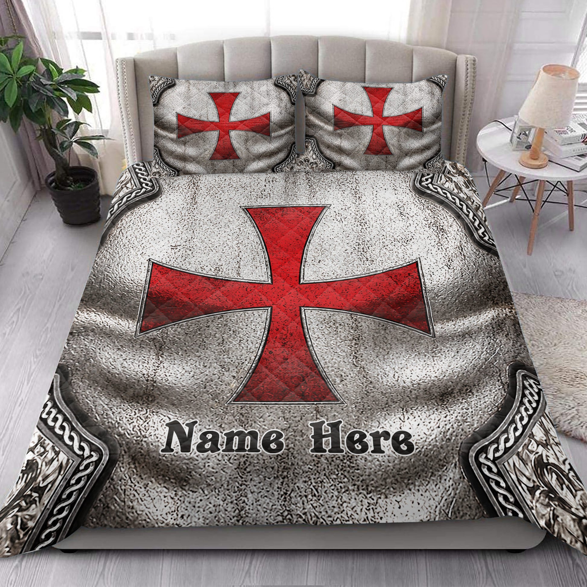 Knights Templar quilt bedding styled in a bright bedroom with bold red cross artwork and ornate medieval borders