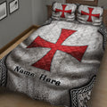 Medieval Knights Templar quilt blanket displayed across a bed with large red cross artwork and silver detailing