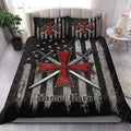 Knights Templar quilt bedding styled in a bedroom with bold red crosses, crossed swords, and black medieval artwork