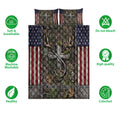 Hunting quilt bedding set shown front-facing with deer antler artwork, camouflage details, and flag-inspired borders