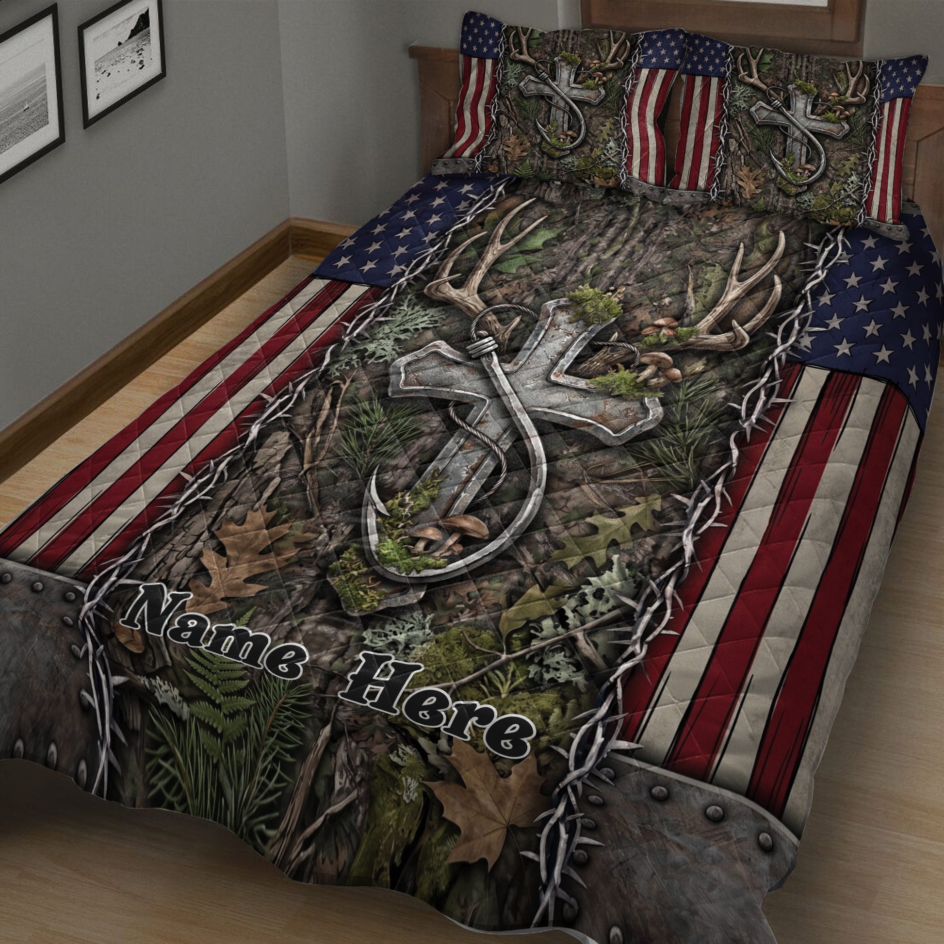 Close bedroom view of hunting quilt bedding with antlers, forest foliage, stars, and red striped borders