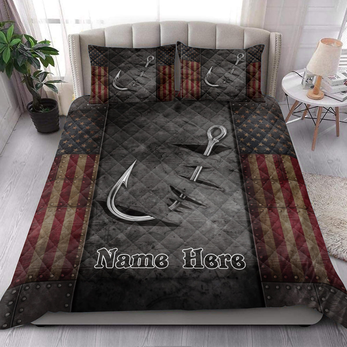 Fishing quilt blanket styled on a bedroom bed with hook artwork, star panels, and striped patriotic borders