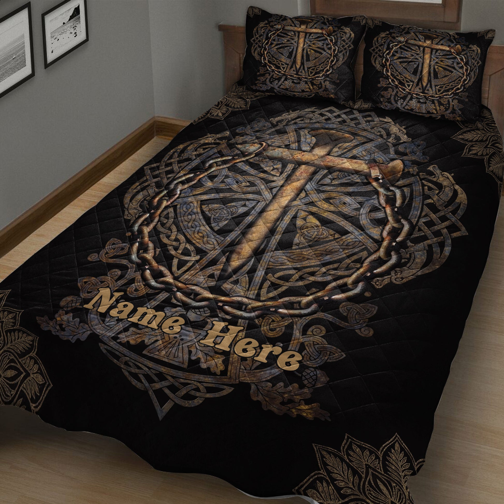 Close bedroom view of a black Christian cross quilt with Celtic knotwork, chain details, and ornate borders