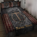 Christian quilt blanket displayed on a bed with a cross, crown of thorns, and patriotic flag accents