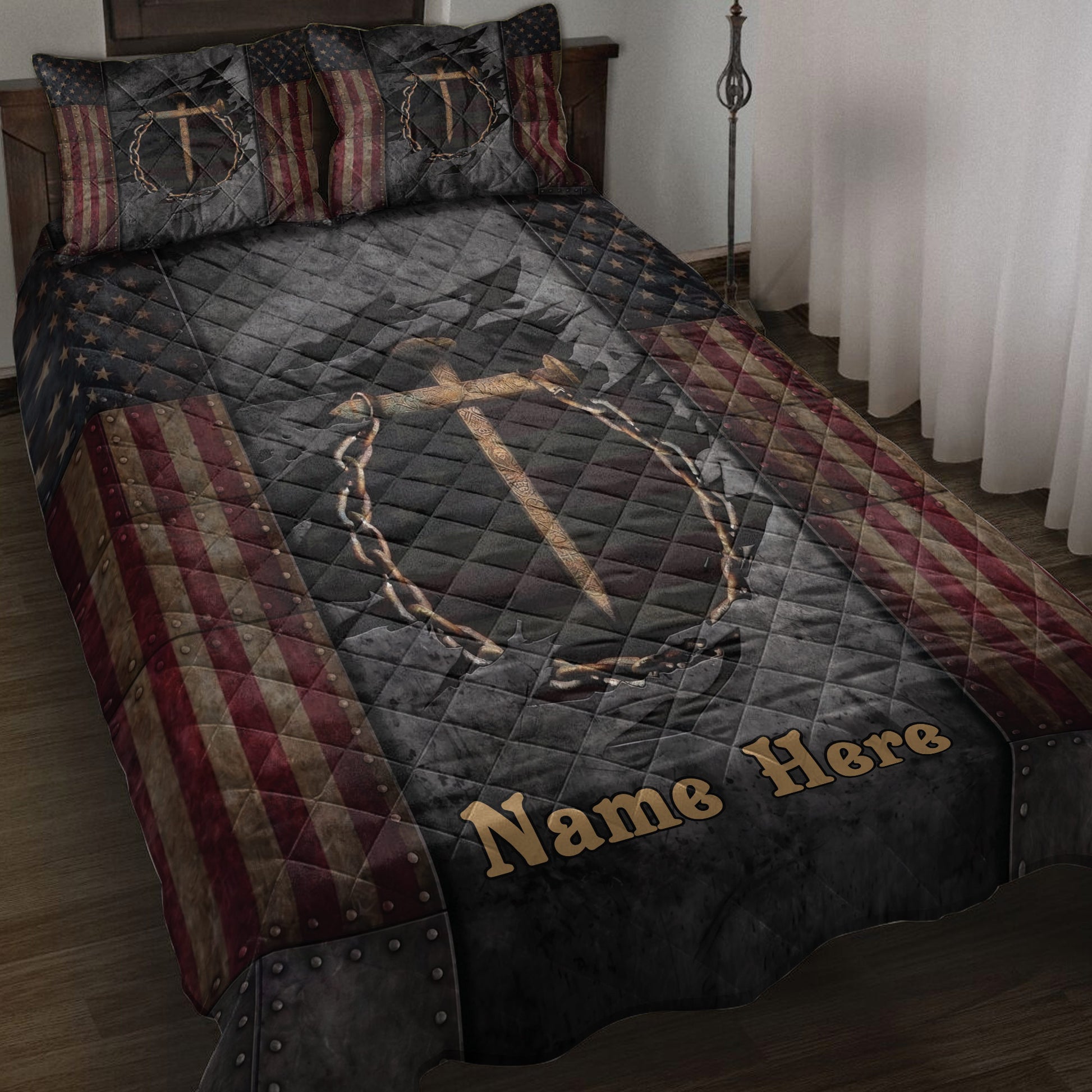 Christian quilt blanket displayed on a bed with a cross, crown of thorns, and patriotic flag accents