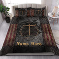 Christian cross quilt blanket styled on a bedroom bed with matching printed pillow covers