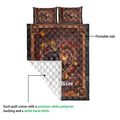 Dachshund quilt blanket showing the printed front and white quilted backing