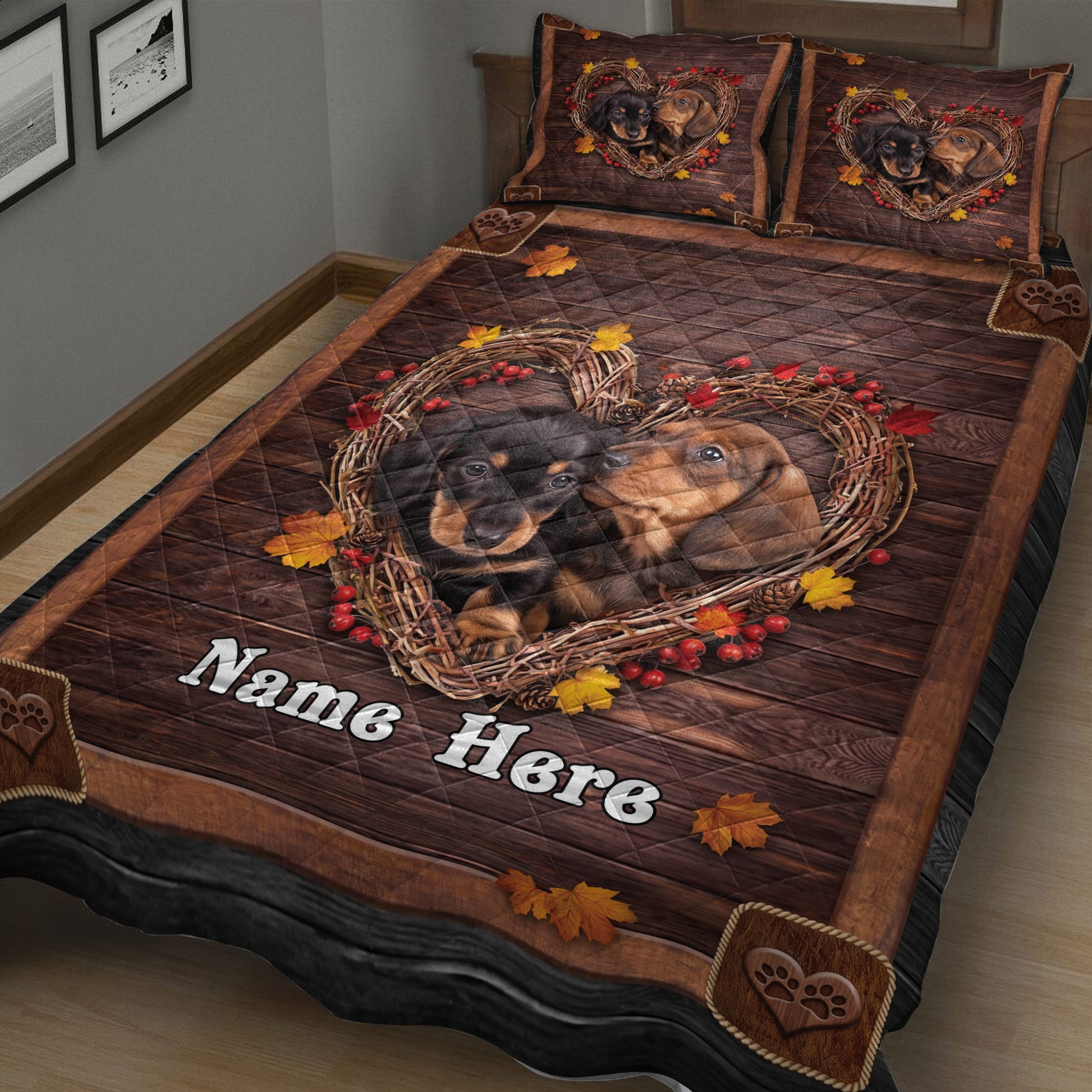 Close view of dachshund dogs in a heart-shaped autumn wreath on a rustic quilt blanket
