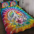 Hippie quilt blanket with colorful tie-dye artwork, peace symbol, floral bouquet, and bedroom styling