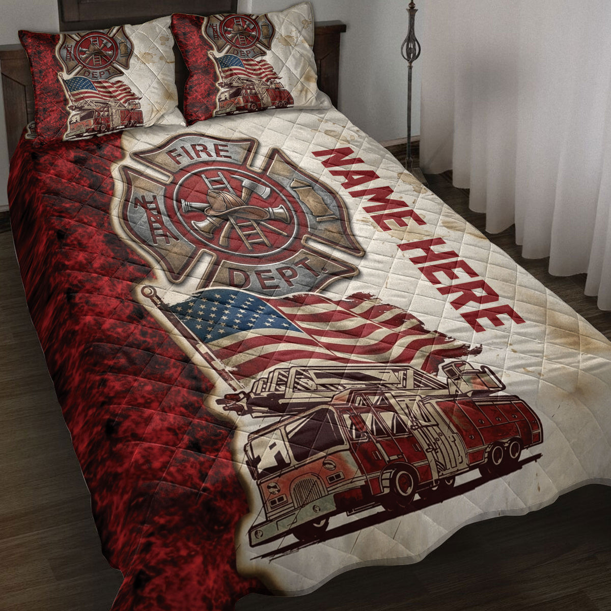 Firefighter quilt blanket displayed on a bed with fire truck artwork, patriotic flag details, and red accents