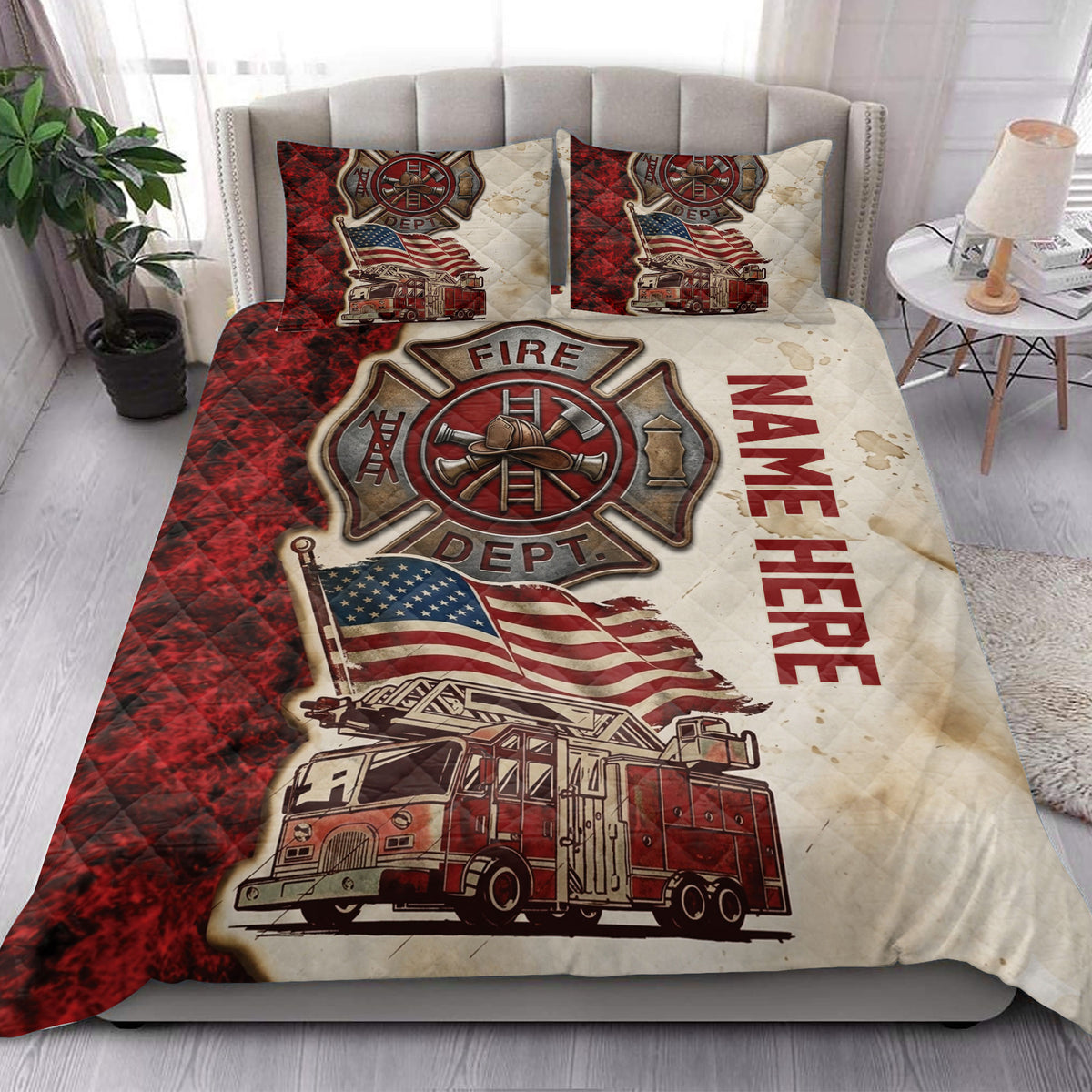 Firefighter quilt blanket styled on a bed with fire truck, helmet, crossed tools, and American flag artwork