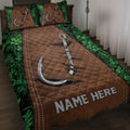 Fishing quilt blanket displayed on a bed with brown tackle-inspired artwork and green camouflage foliage
