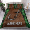 Fishing quilt bedding styled in a bedroom with brown hook artwork and green woodland accents