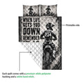 Motocross quilt blanket showing the printed racing design, white quilted backing, and dirt bike rider artwork