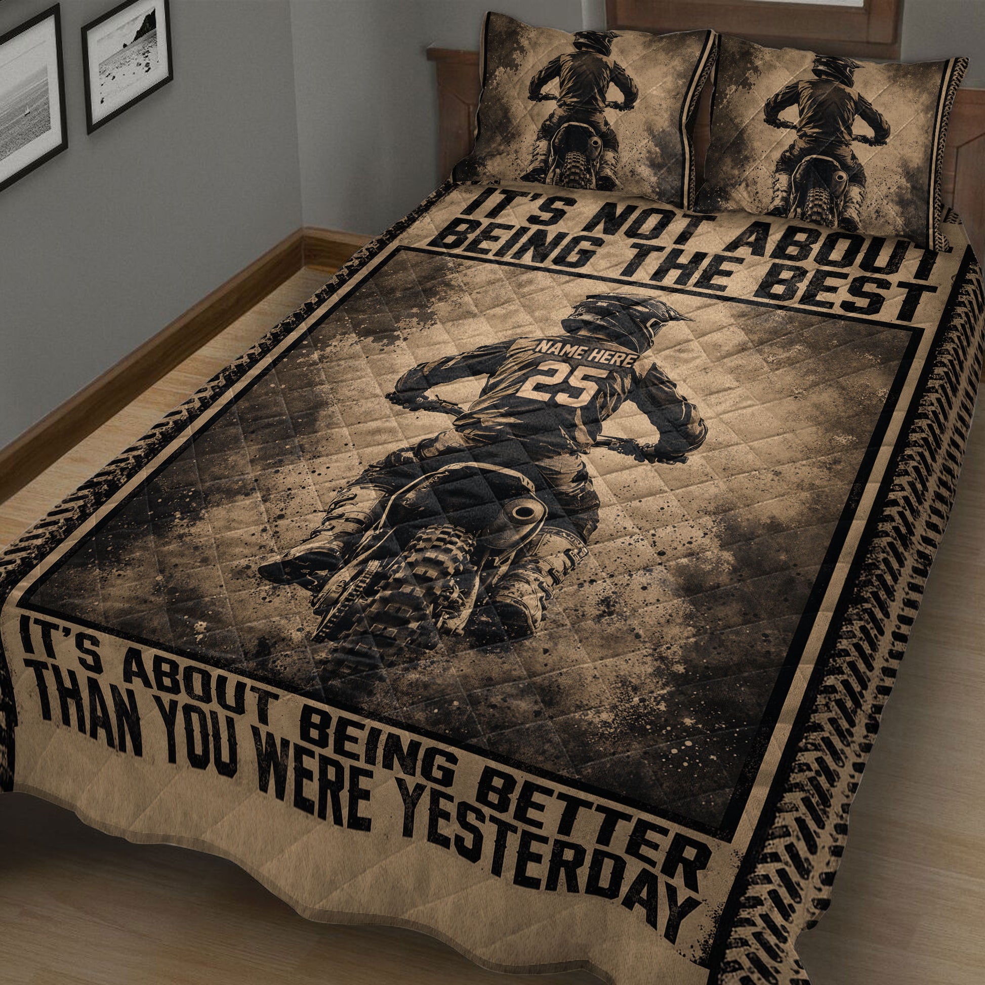 Close-up of motocross quilt bedding with dirt bike rider artwork and bold motivational design