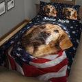 Close bedroom view of a Golden Retriever quilt blanket with patriotic star and stripe design