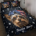 Yorkshire Terrier quilt blanket on a bed with patriotic stars, flags, and matching dog artwork