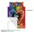 Rainbow LGBT quilt showing the vibrant printable side and white diamond-stitched backing detail