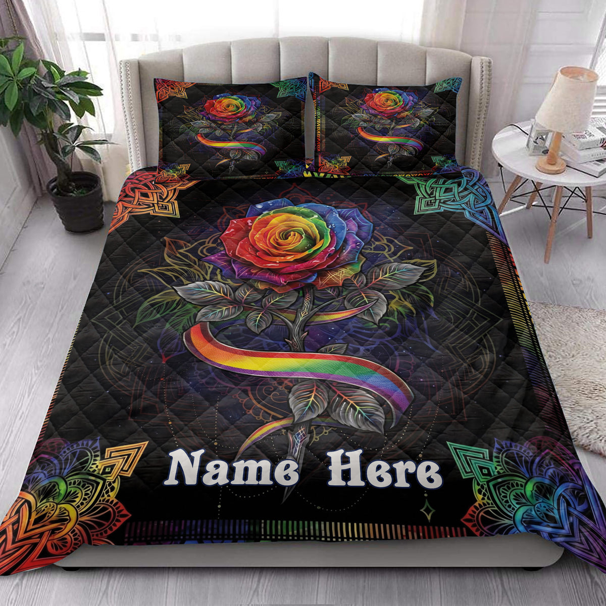 LGBT rainbow rose quilt bedding styled in a bright bedroom with matching floral artwork