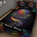 Close view of an LGBT rainbow rose quilt blanket with vivid floral and geometric details