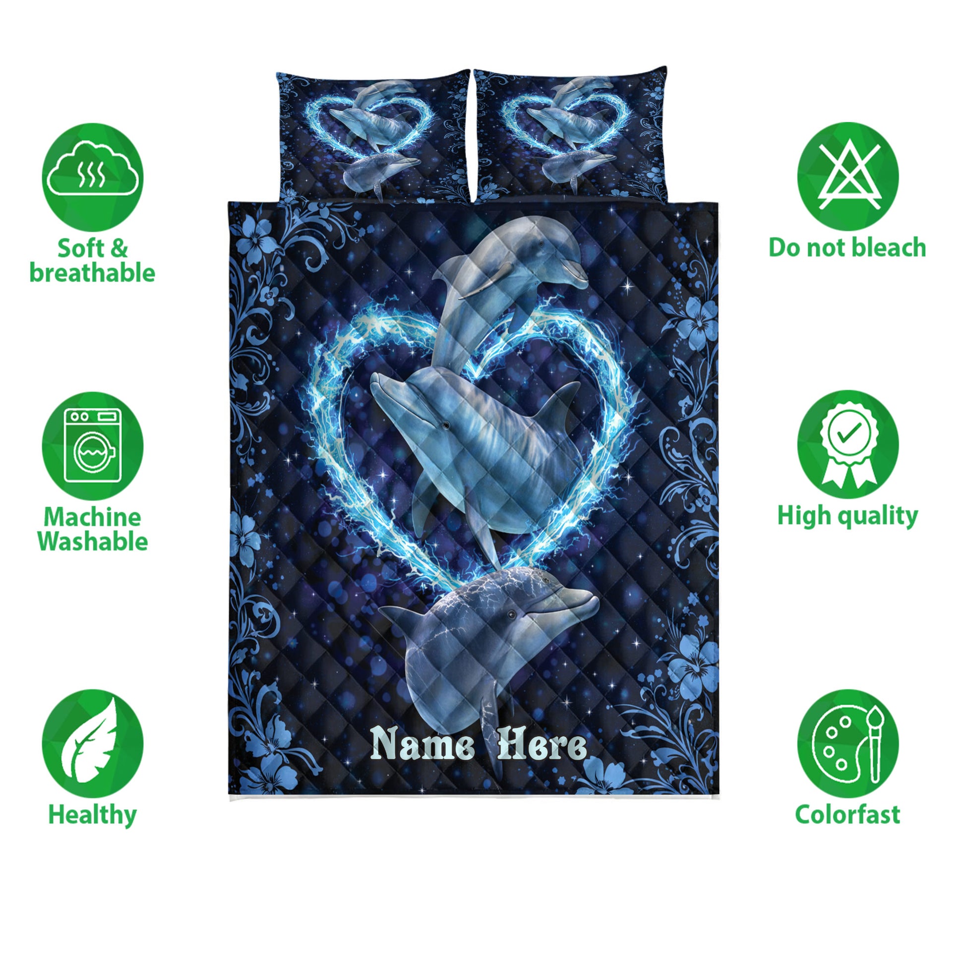 Dolphin quilt bedding displayed against a white background with soft, washable, and colorfast feature icons