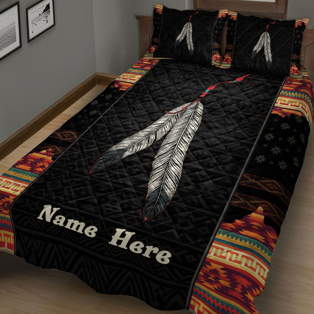 American Native quilt blanket arranged on a bed with layered feather artwork and Southwest-style geometric patterns