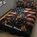 Rottweiler dog quilt blanket shown in a cozy bedroom with bold red, white, blue and black artwork