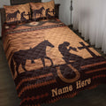 Cowboy quilt blanket displayed on a bed with horse silhouettes, horseshoes, western patterns, and warm brown tones