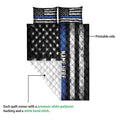 Police quilt blanket shown with its printed front and white quilted backing visible in a detail view