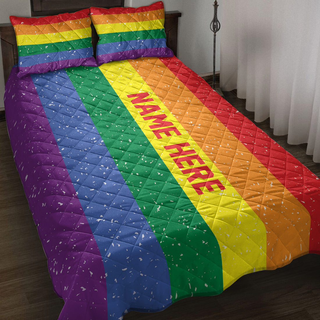 Rainbow Pride quilt blanket styled on a bed with colorful stripes and bright bedroom decor