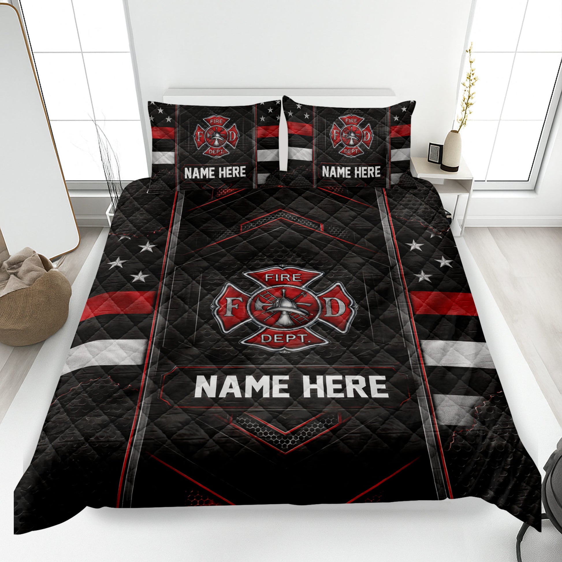 Firefighter quilt blanket displayed on a bed with black, red, and white fire department artwork