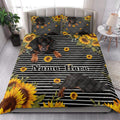 Dachshund quilt bedding styled on a bed with sunflowers, black stripes, and coordinating pillowcases