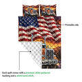 Trucker quilt showing a vibrant semi truck and American flag print with a quilted reverse side