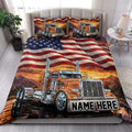 Patriotic trucker quilt blanket styled on a bed with bold semi truck and sunset mountain artwork
