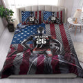 Soccer quilt blanket styled in a bedroom with bold player artwork, soccer balls, and red, white, and blue decor