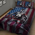 Close view of soccer quilt bedding with player artwork, soccer ball details, and dramatic red, black, white, and blue colors