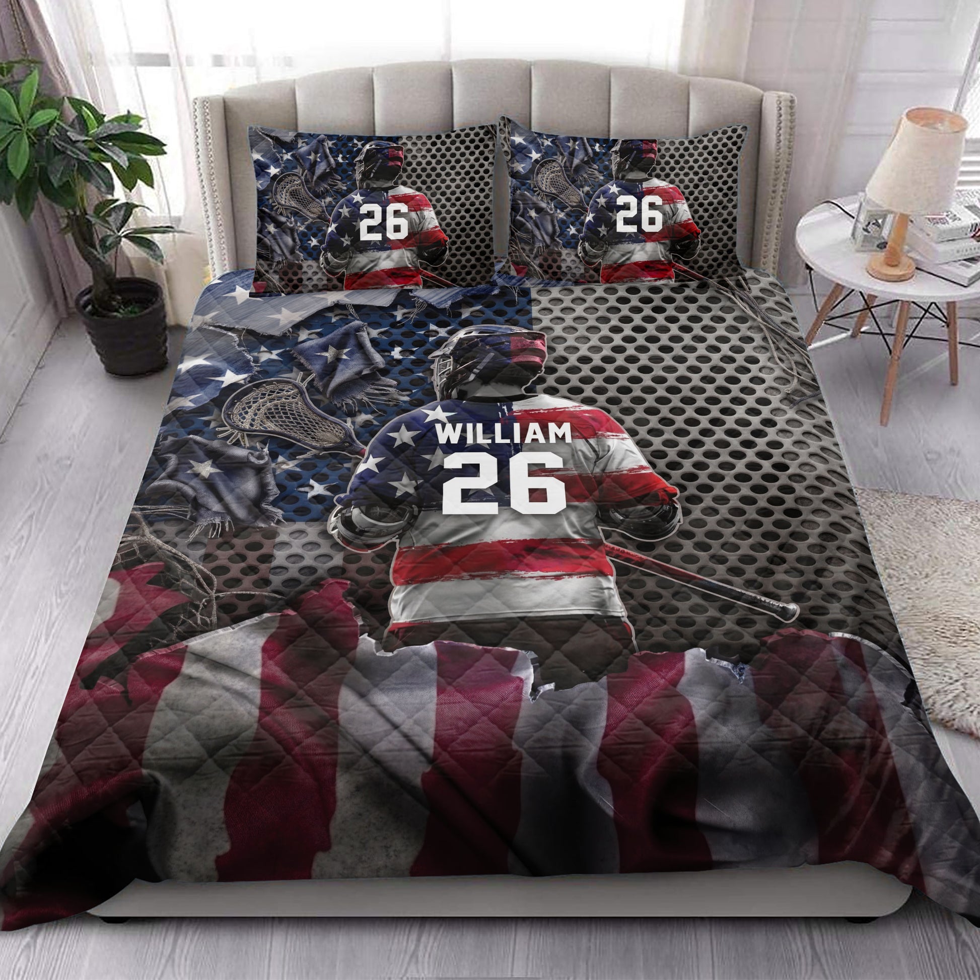 Lacrosse quilt bedding styled in a bright bedroom with player, stick, and patriotic artwork