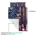 Motocross quilt detail showing the printed rider design, quilted backing, and white stitched underside