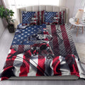 Motocross quilt bedding set styled in a bright bedroom with dirt bike rider artwork and patriotic racing colors