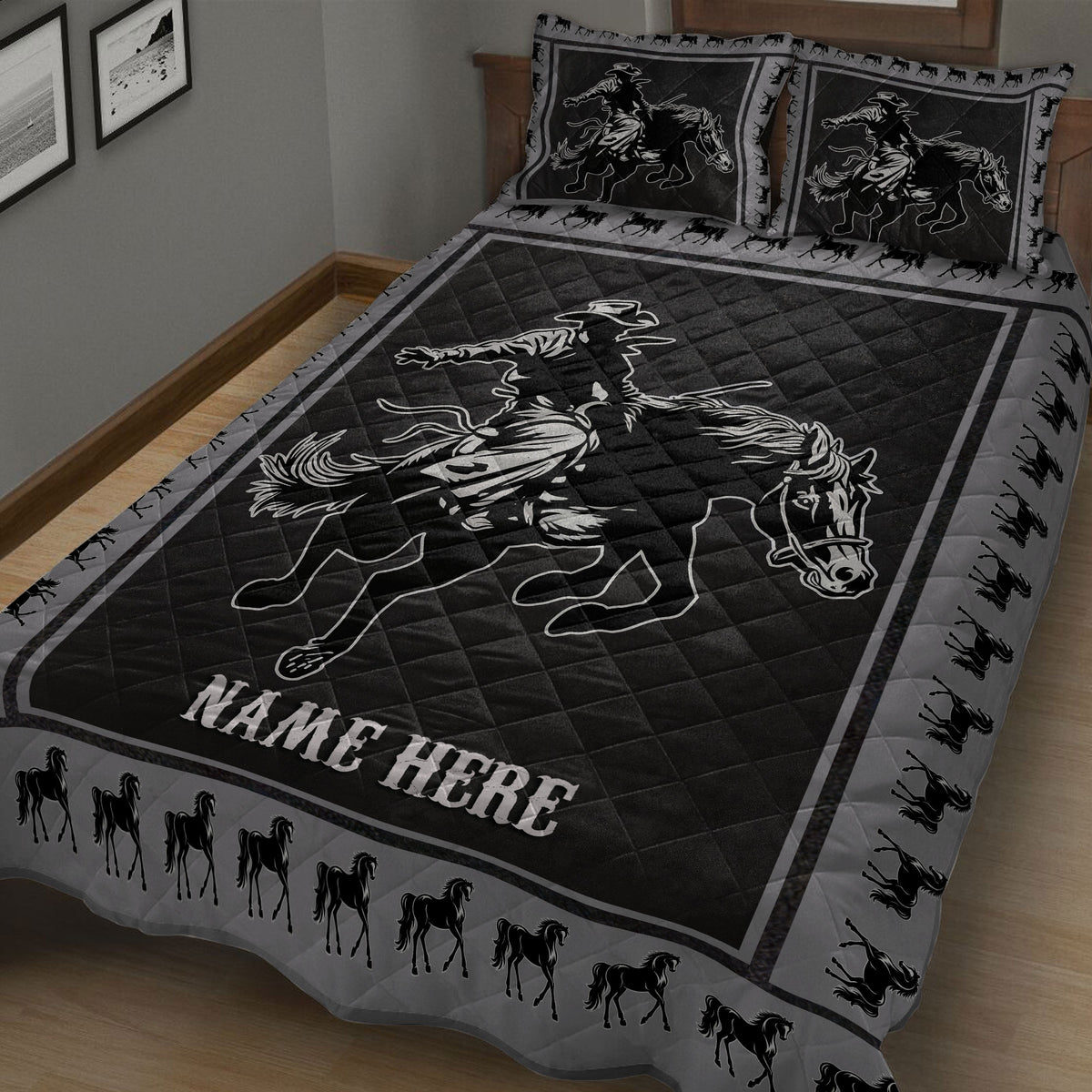 Black rodeo quilt blanket on a bed with Western cowboy artwork and horse-print borders