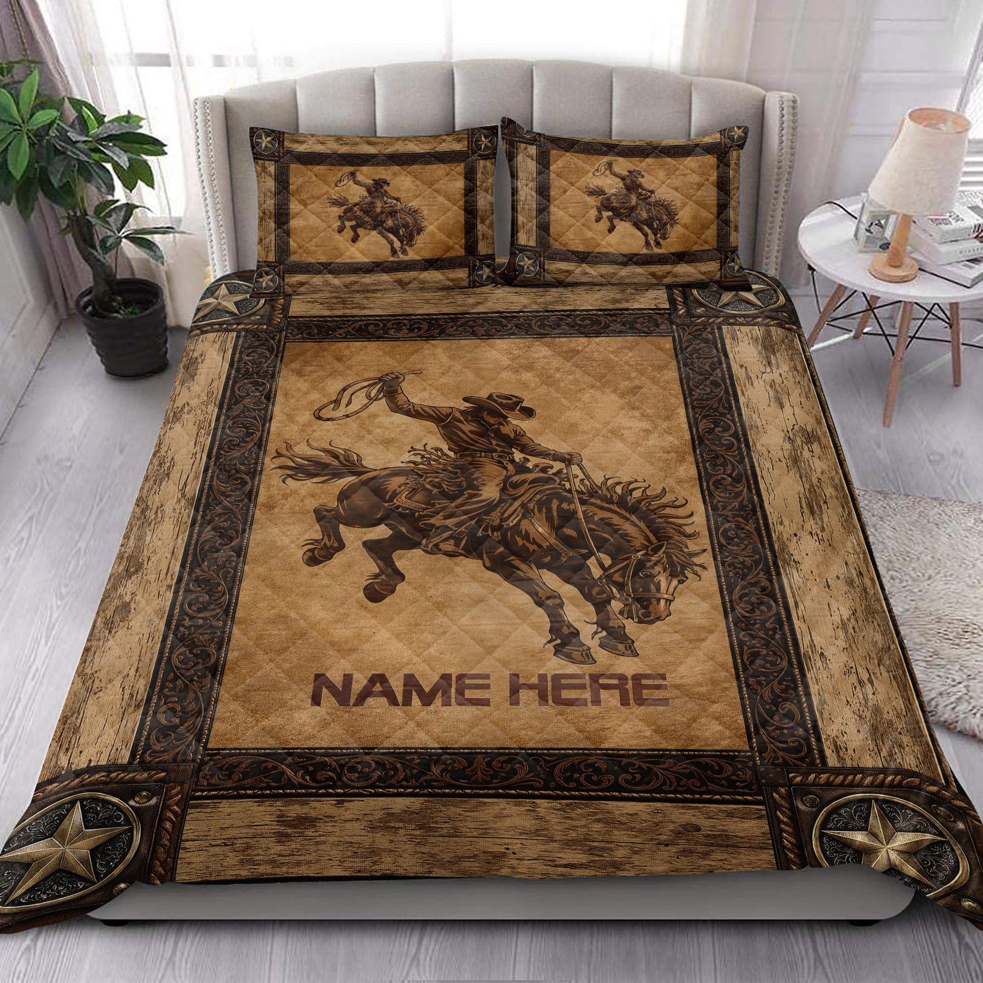 Western rodeo quilt blanket styled on a bed with cowboy and bucking horse artwork