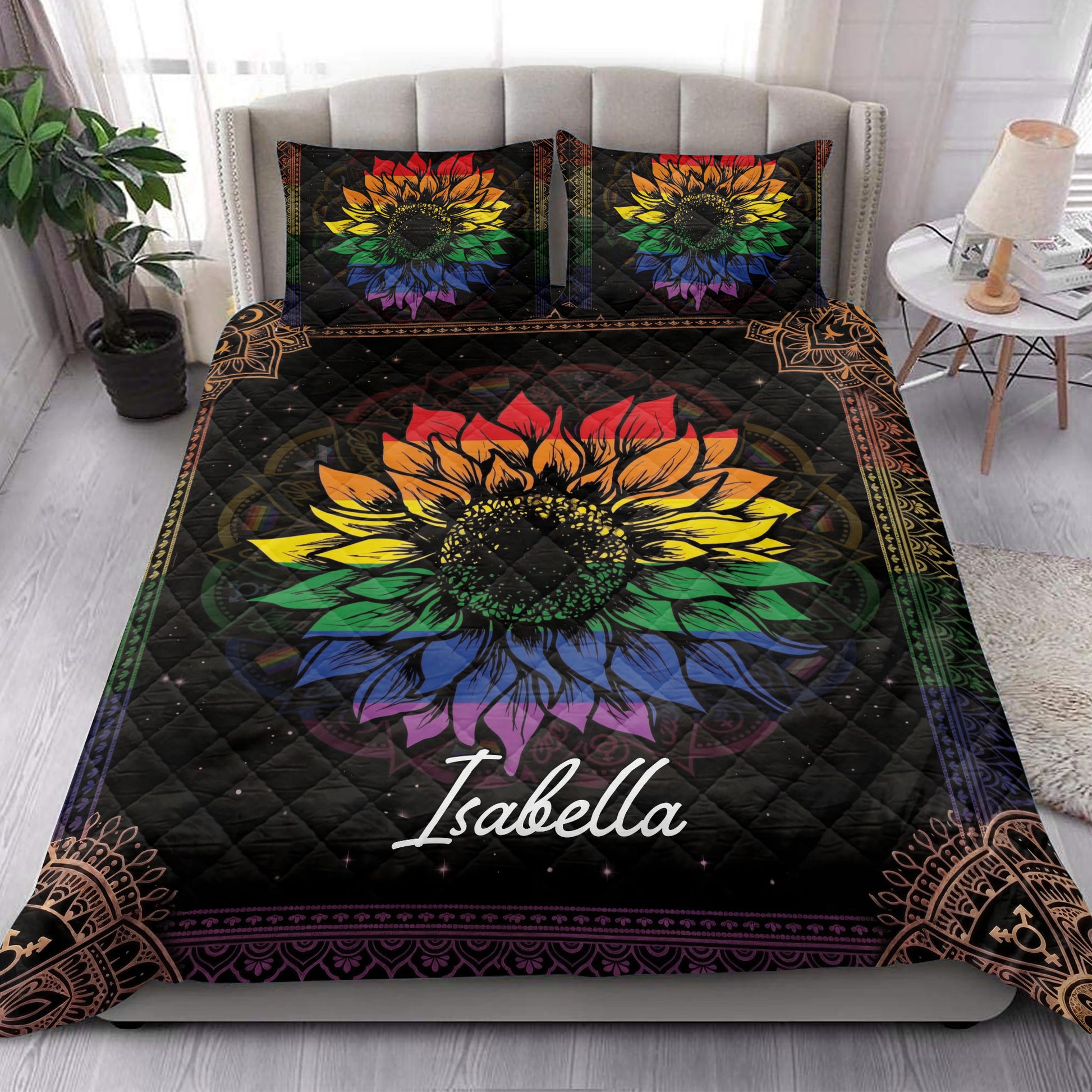 Rainbow sunflower pride quilt bedding styled on a modern bedroom with matching pillow covers