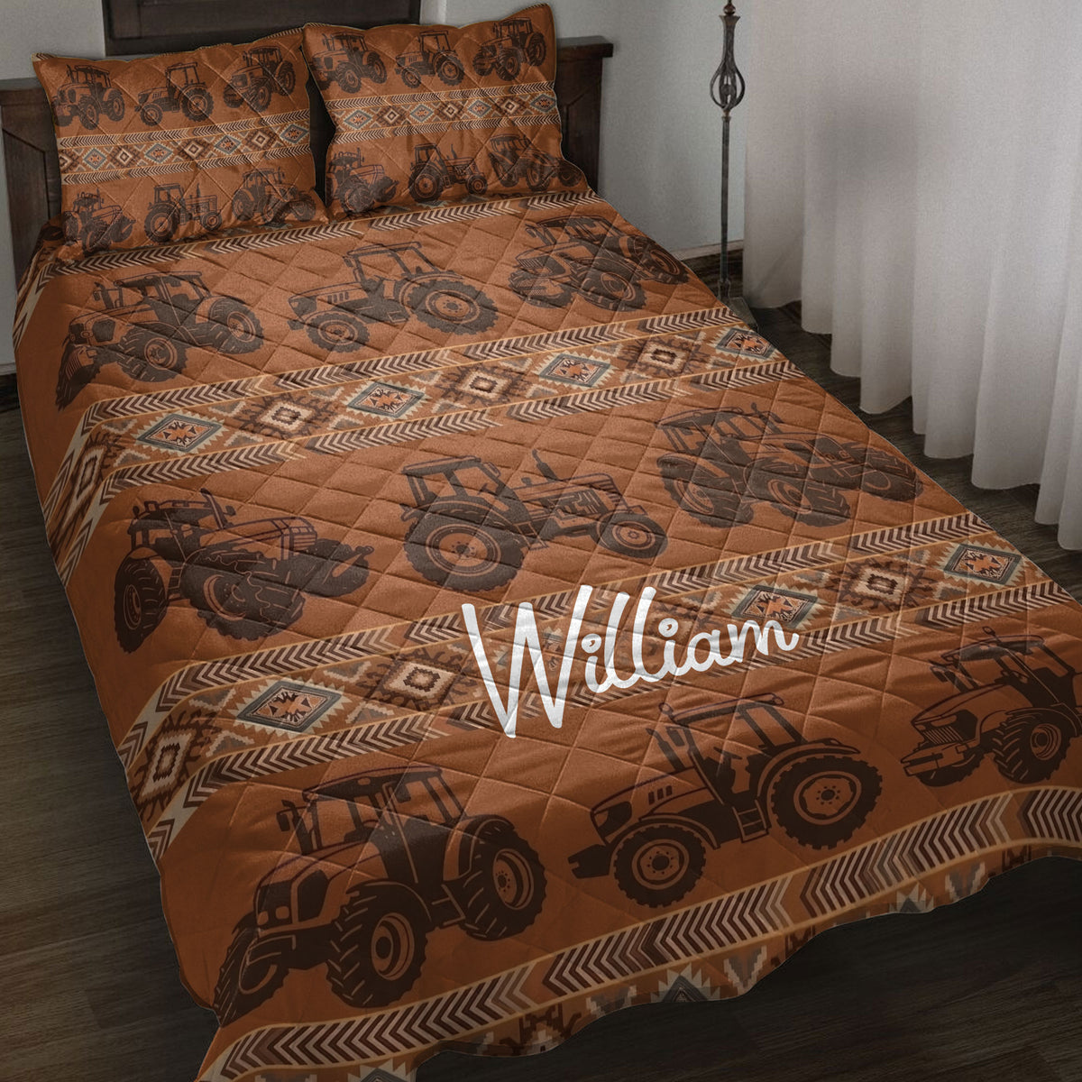 Brown tractor quilt bedding set displayed on a bed with rustic geometric borders and farm vehicle artwork