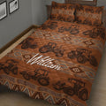 Angled bedroom view of a brown tractor quilt with rustic geometric bands and farm vehicle artwork