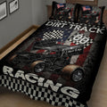 Close bedroom view of a dirt track racing quilt with sprint cars, racing flags, and black, red, and white artwork