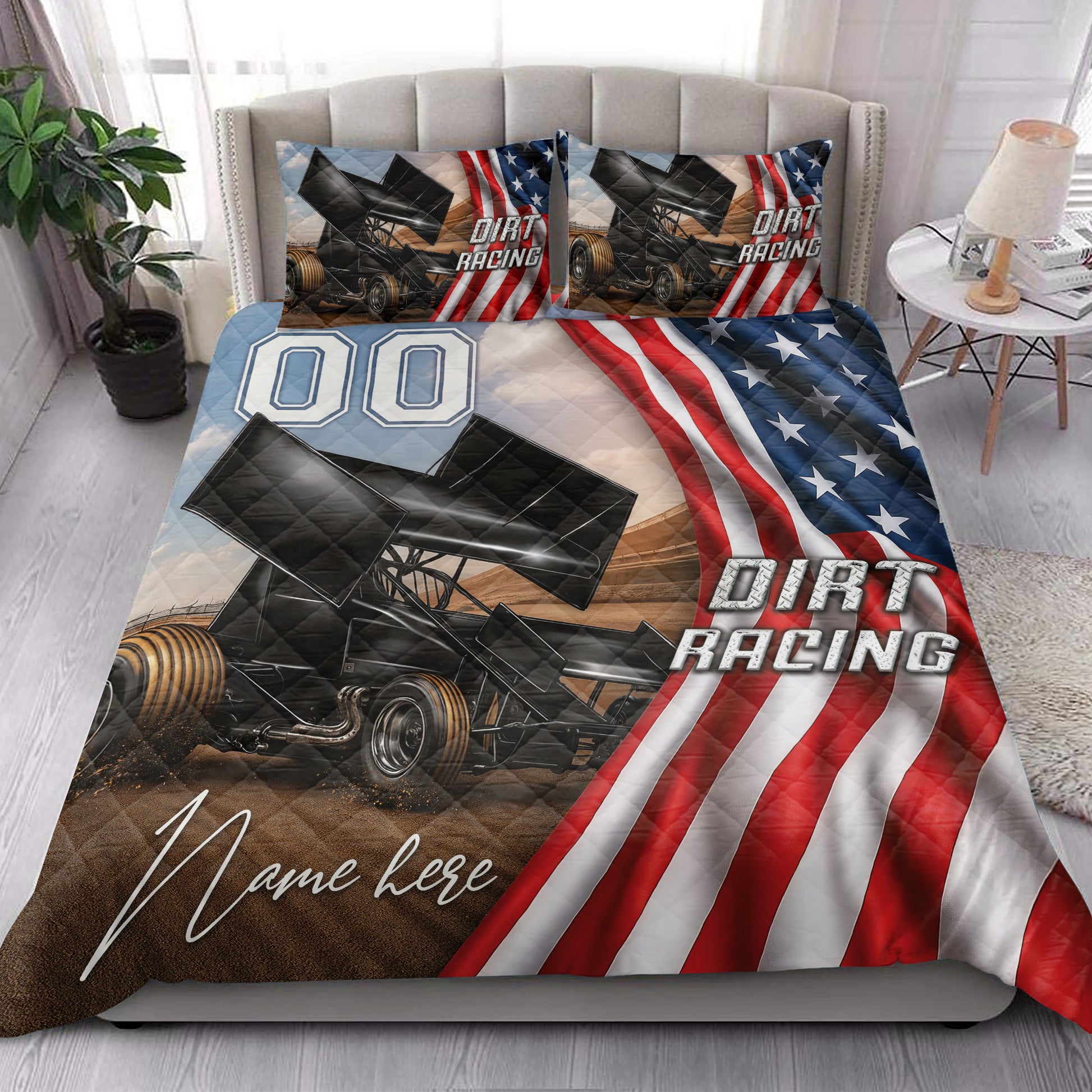 Dirt track racing quilt blanket styled on a bedroom bed with sprint cars, racing graphics, and patriotic colors