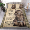 Maine Coon cat quilt bedding styled in a bright bedroom with large cat portrait artwork