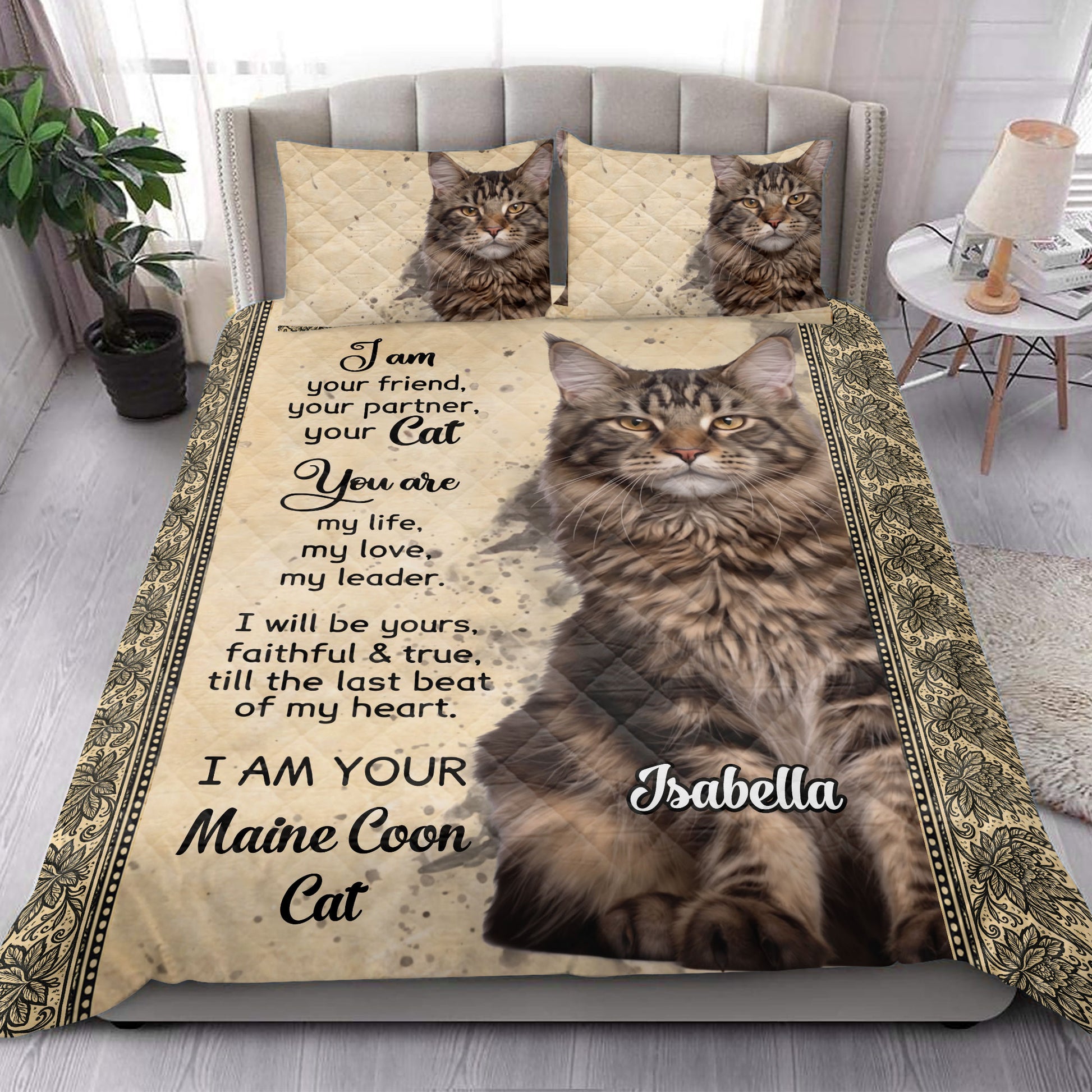 Maine Coon cat quilt bedding styled in a bright bedroom with large cat portrait artwork