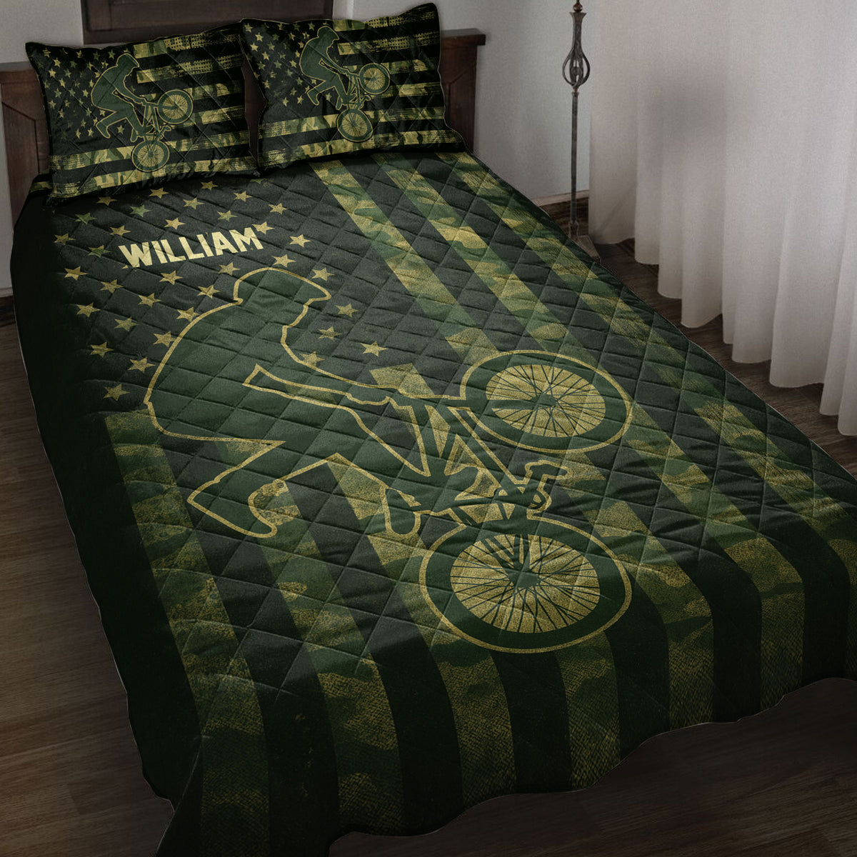 BMX rider and bicycle artwork on a dark green and gold quilt blanket in a bedroom